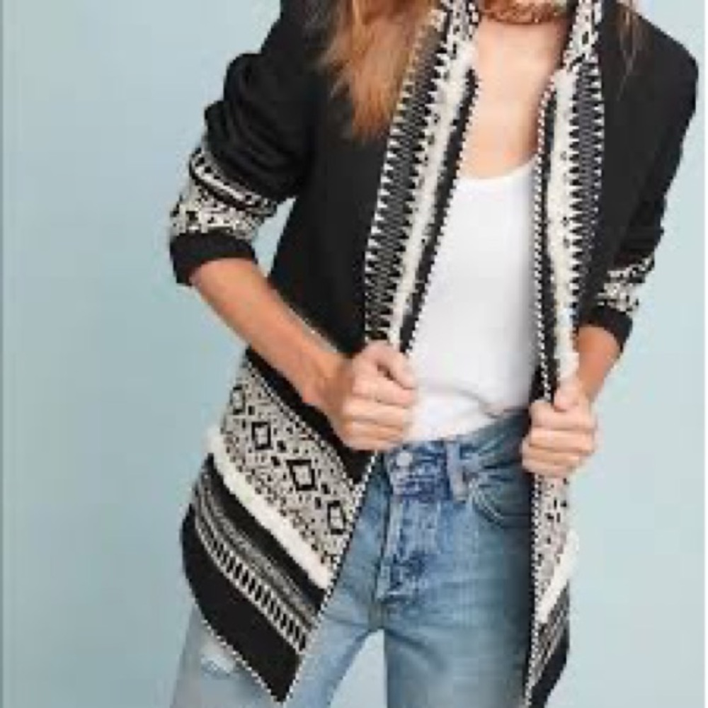 Small anthropologie cortinnier wonderland jacket.
